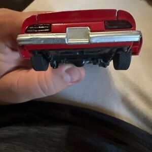 Vintage Red Model Car with Black Wheels